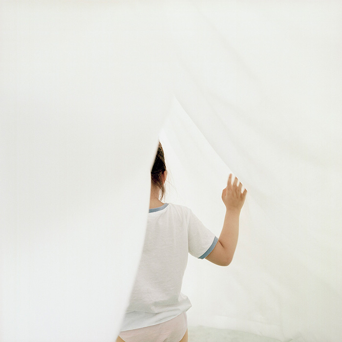 a man going inside wet sheet,inkjet print,90X90cm,2012.jpg